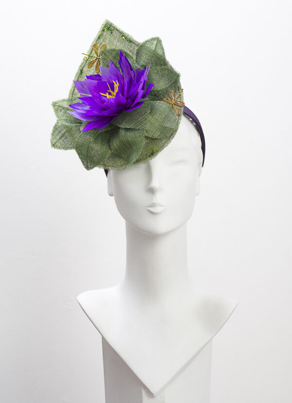 Green headpiece with purple feather waterlily